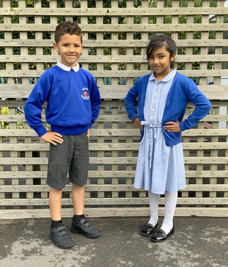 Two pupils in school uniform